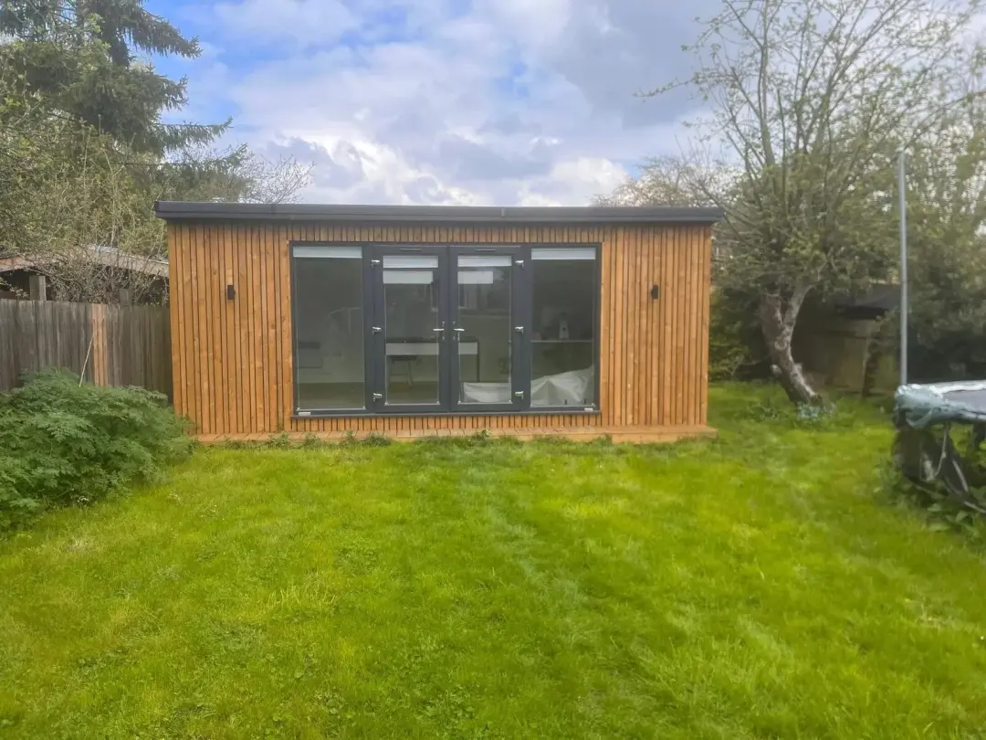 Timber garden office on a lawn